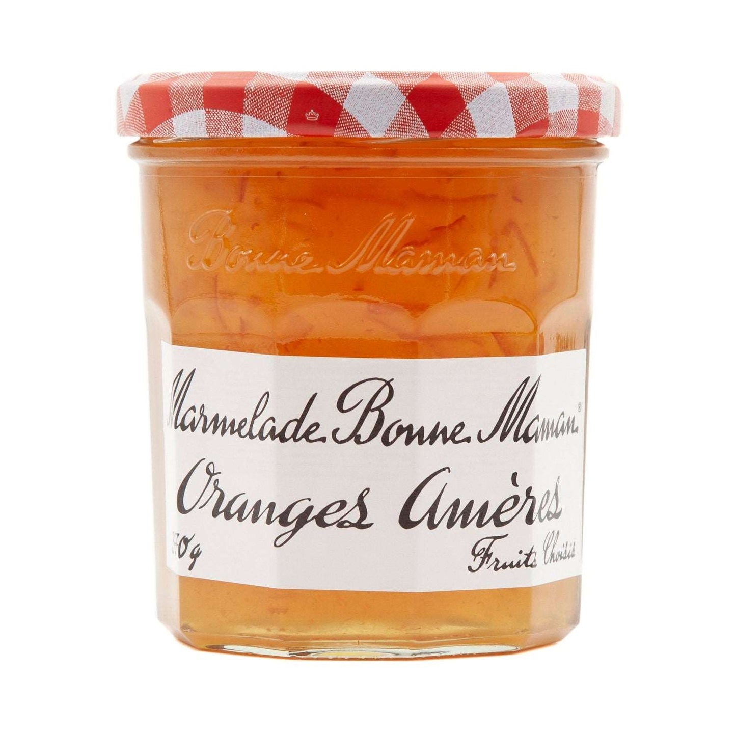 a bottle of alcohol sitting on top of a bench