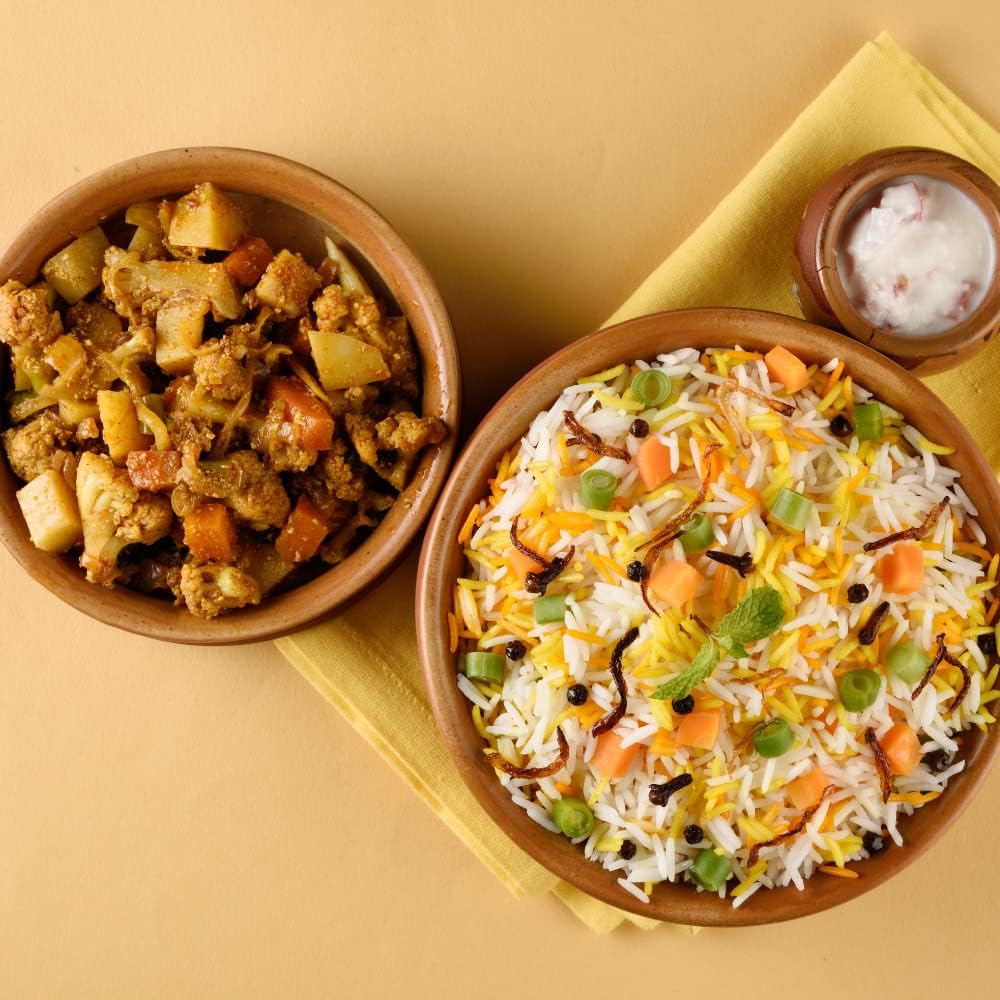 a couple of plates of food on a table