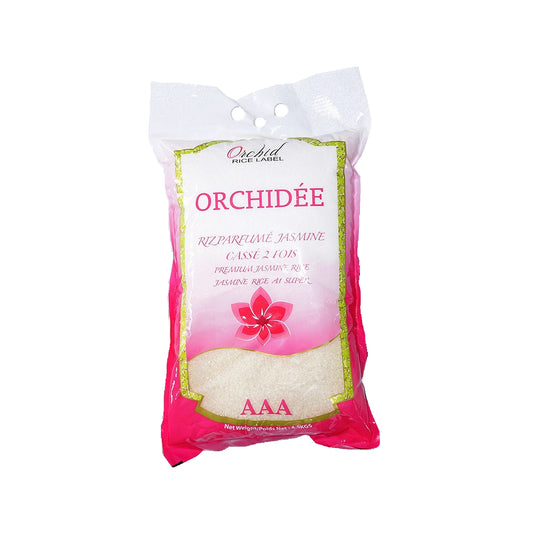 a pink cake that is sitting on a bench