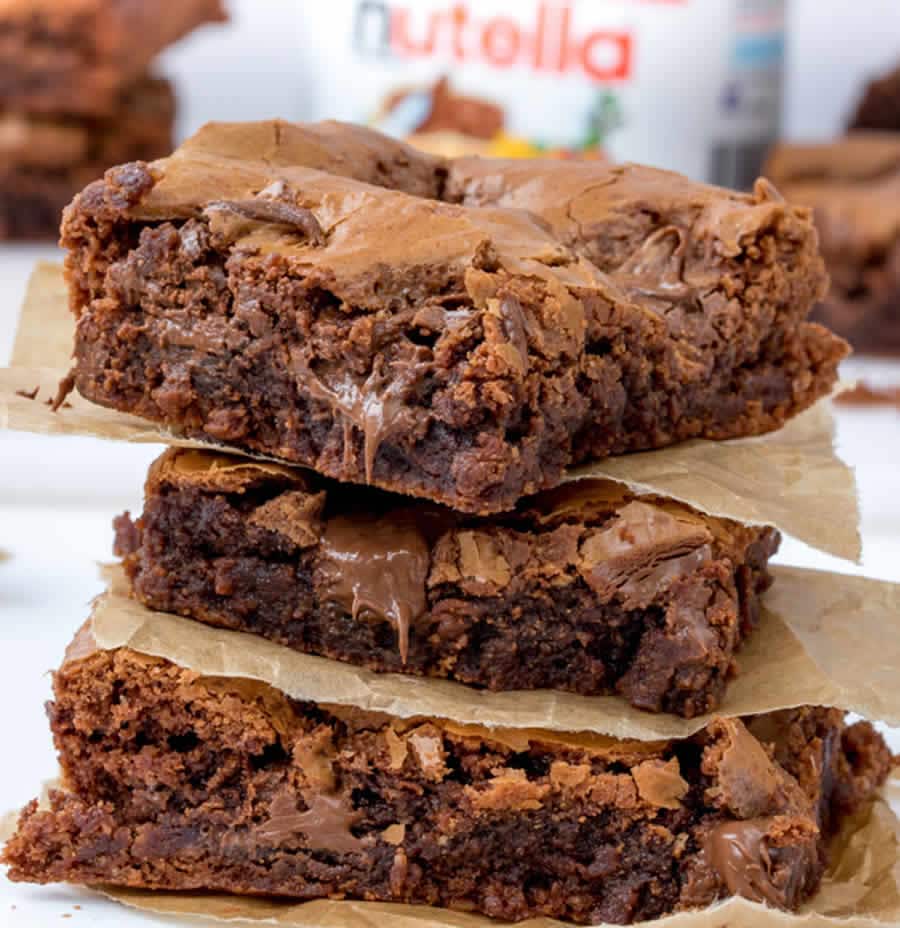 a close up of a chocolate cake on a plate 