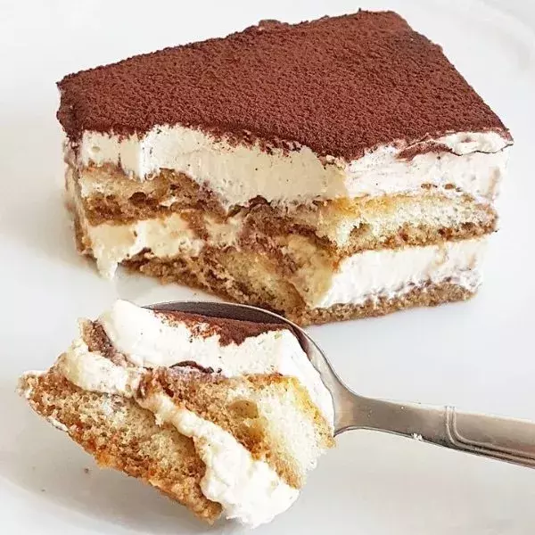 a piece of cake sitting on top of a white plate 